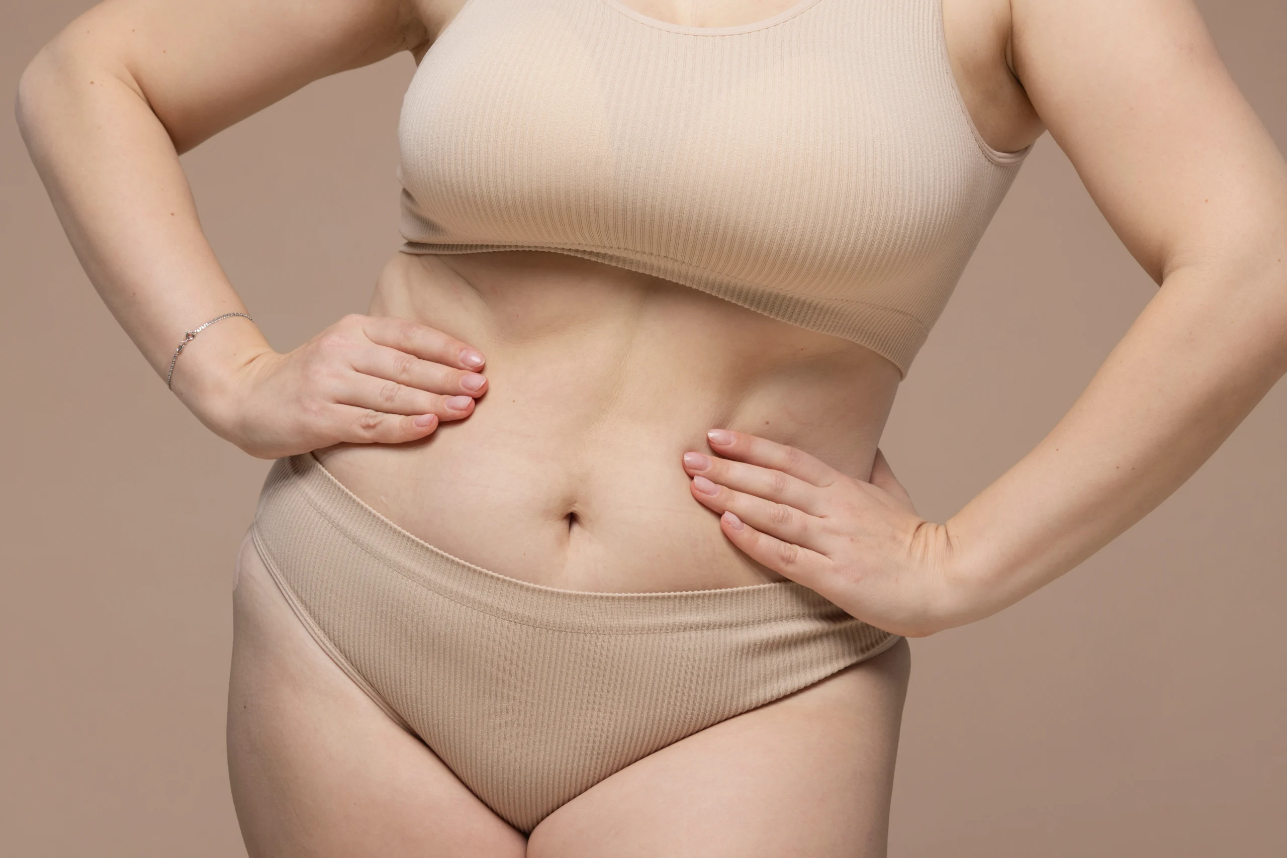 Clinical view of a patient's abdomen demonstrating the refined contours achieved through a tummy tuck UK procedure.