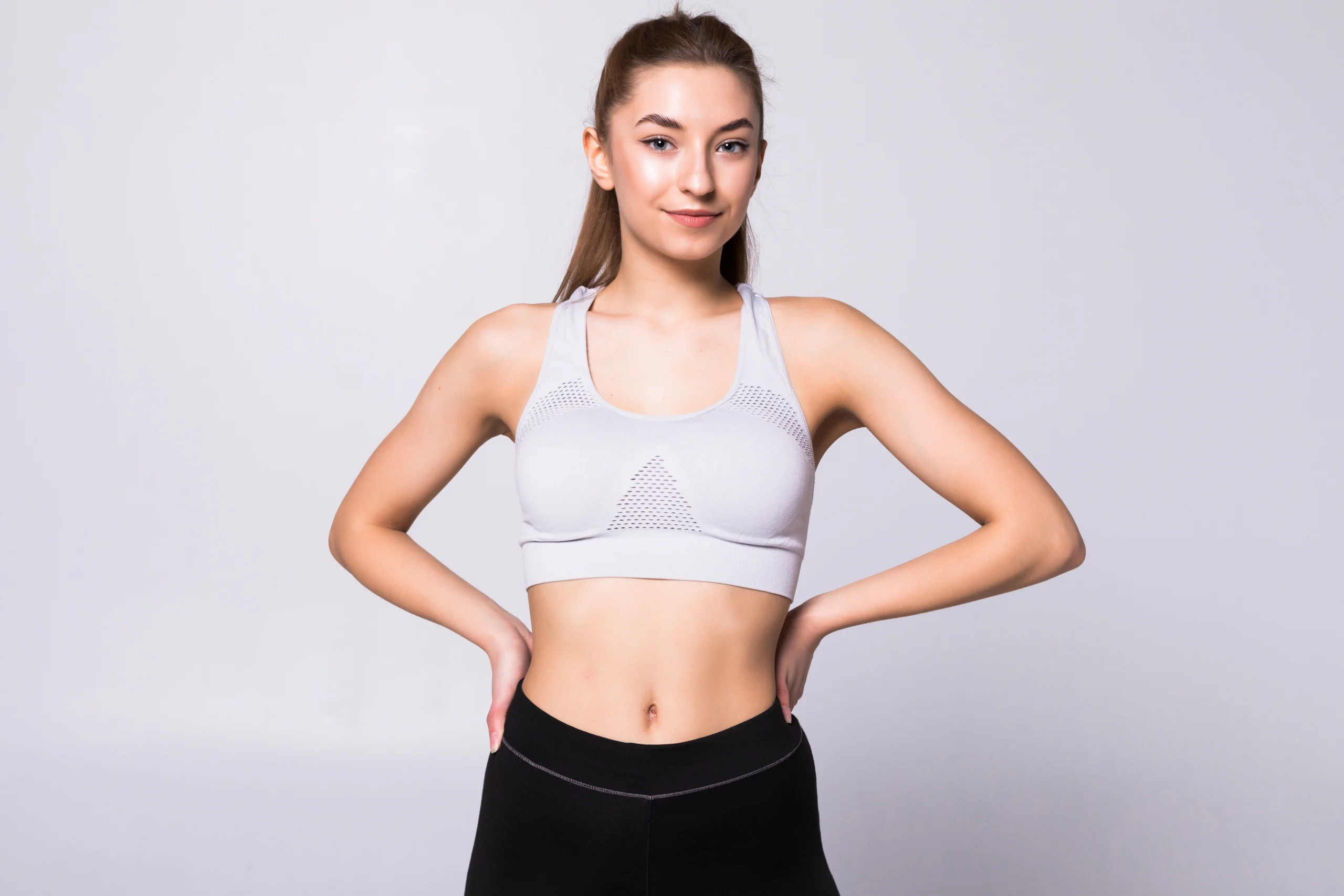 Post-surgical results for tummy tuck UK patients showcasing contoured abdominal profiles.