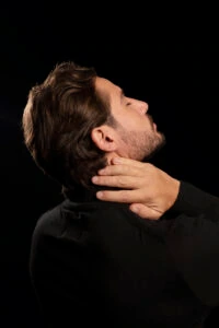 Male patient demonstrating follicular thinning in the occipital region before a hair transplant UK.