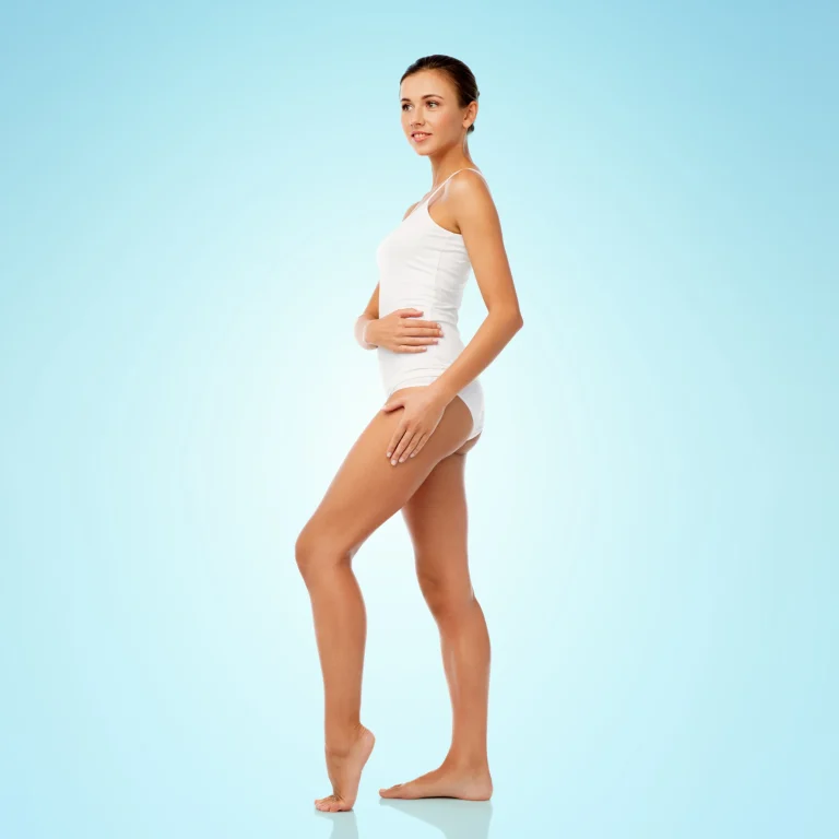 beauty-people-anticellulite-bodycare-concept-beautiful-young-woman-white-underwear-blue-background
